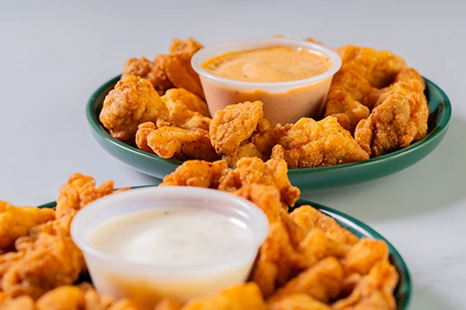 Gator Bites with dipping sauces at N'Orlins Cafe.